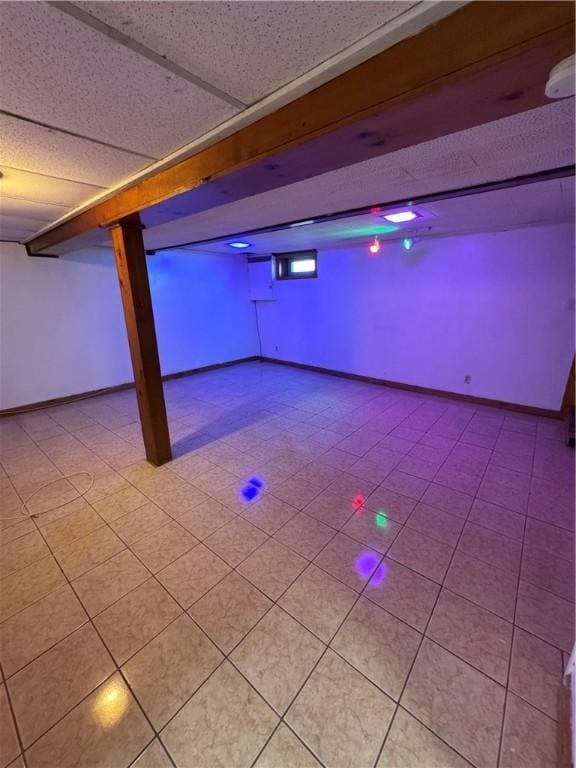 basement with a drop ceiling