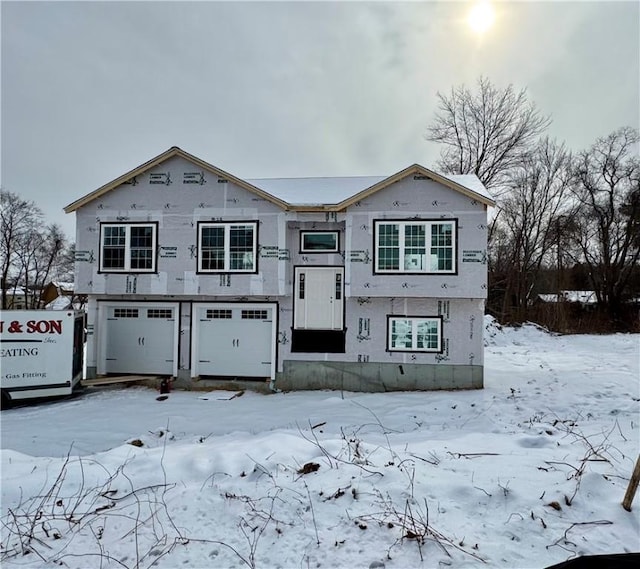 view of front of property featuring a garage