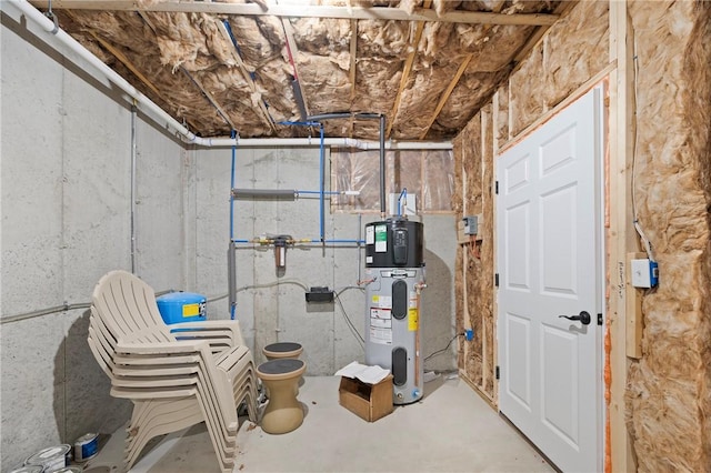 utility room featuring hybrid water heater