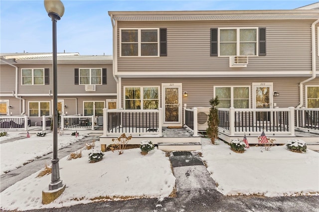 view of snow covered property