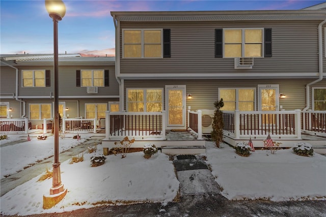 view of snow covered property