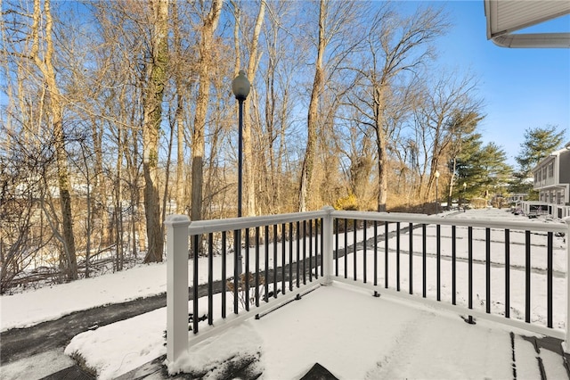 view of snow covered deck