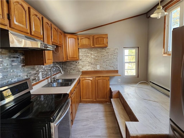 kitchen with vaulted ceiling, tasteful backsplash, a baseboard radiator, sink, and stainless steel appliances