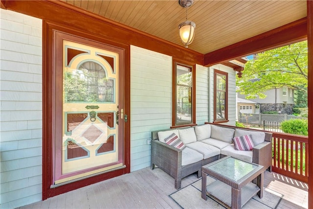 wooden terrace with a porch