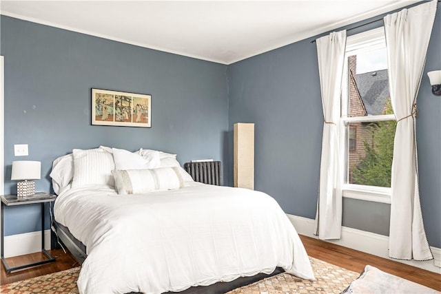 bedroom featuring hardwood / wood-style flooring