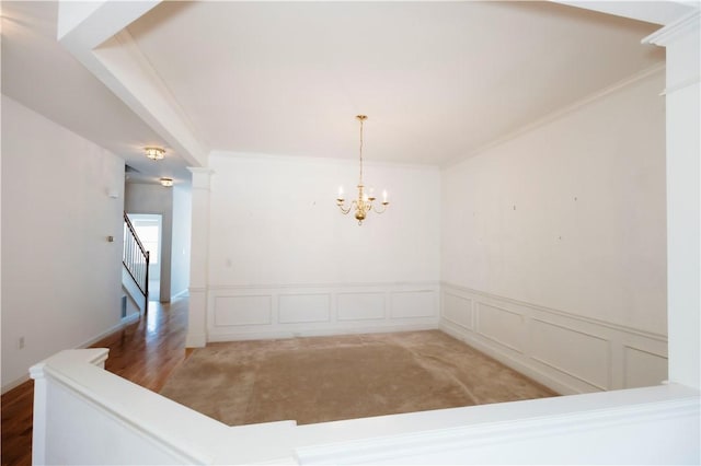 interior space with a notable chandelier and ornamental molding