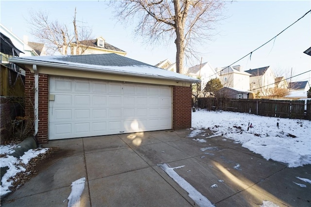 view of snow covered garage