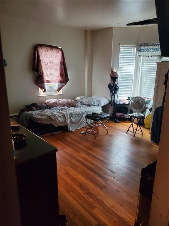 bedroom featuring hardwood / wood-style flooring