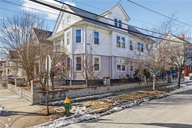 view of snow covered property