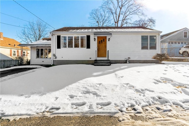 view of front of home featuring a garage