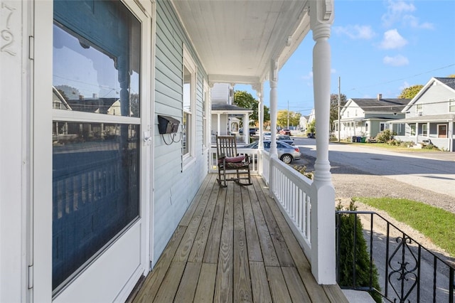 wooden deck featuring a porch