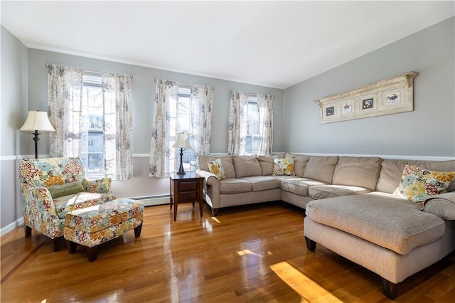 living room featuring hardwood / wood-style floors and baseboard heating