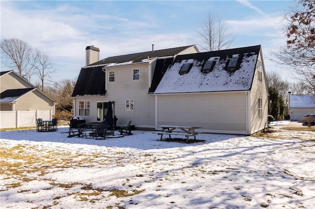 view of snow covered property