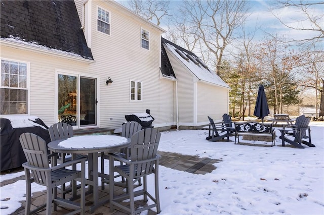 view of snow covered patio