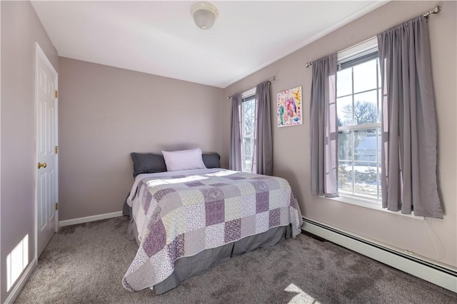 bedroom featuring carpet flooring and baseboard heating