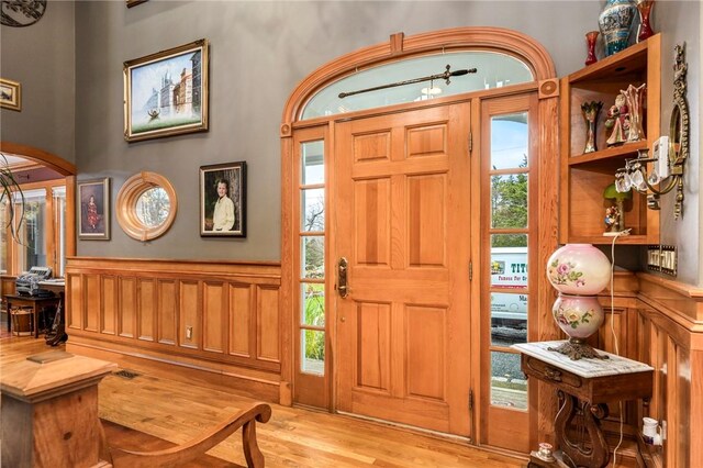 foyer with light hardwood / wood-style flooring