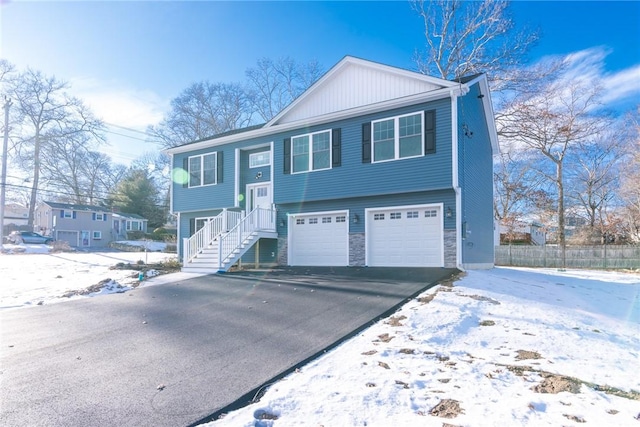 raised ranch with a garage