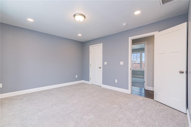 unfurnished bedroom with carpet flooring