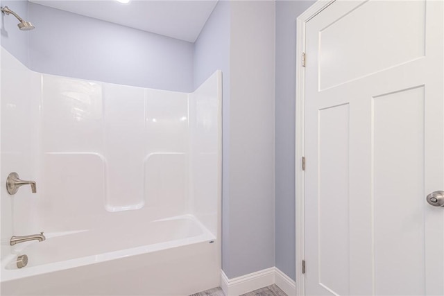 bathroom with shower / bathtub combination