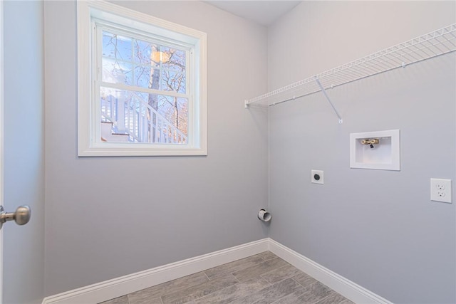 laundry area featuring electric dryer hookup and washer hookup