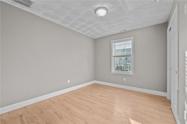 unfurnished bedroom featuring light hardwood / wood-style flooring