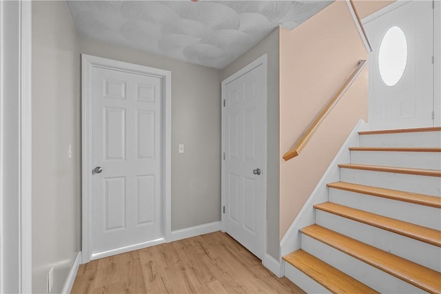 foyer entrance featuring light hardwood / wood-style floors