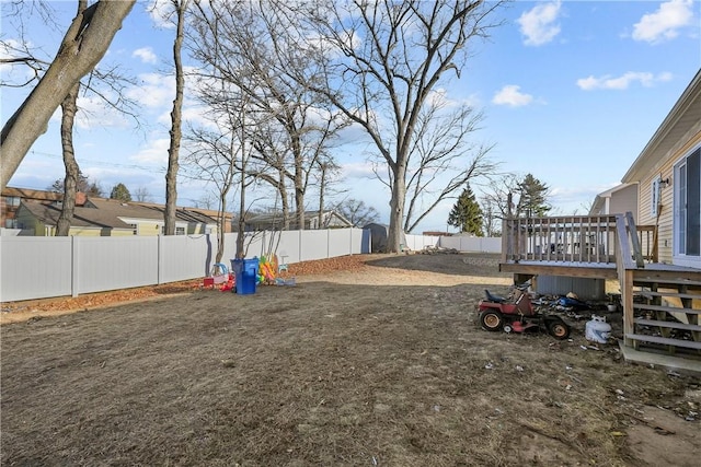 view of yard featuring a deck