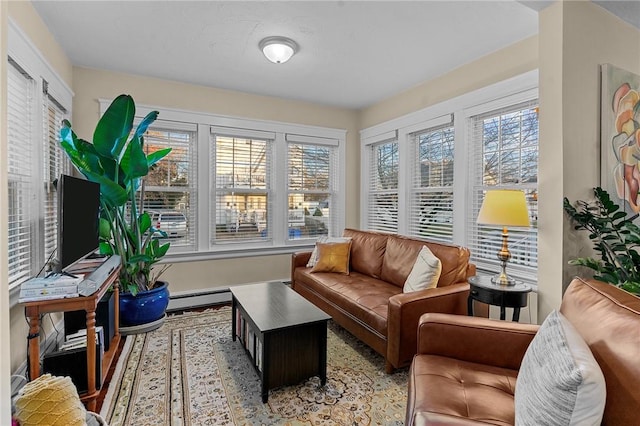 interior space featuring baseboard heating and a wealth of natural light