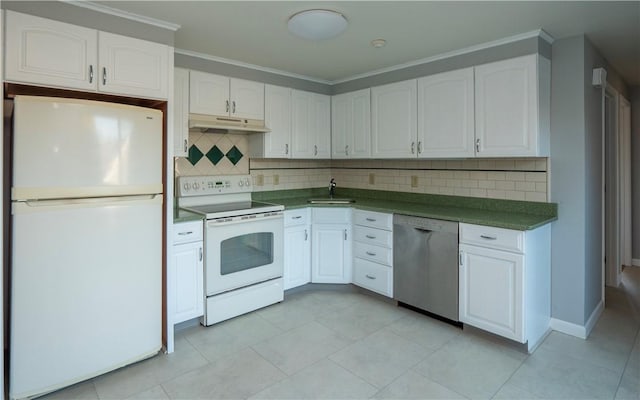 kitchen with tasteful backsplash, white cabinetry, sink, and white appliances