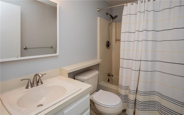 full bathroom featuring shower / tub combo with curtain, vanity, and toilet