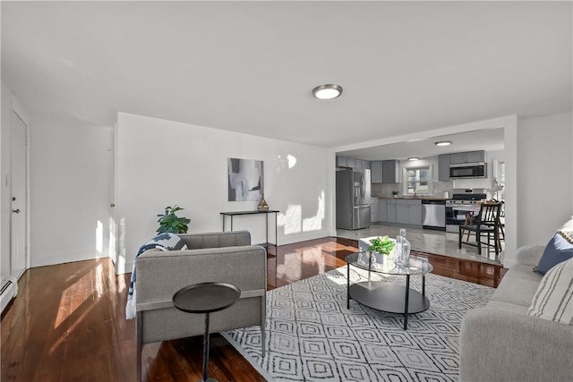 living room with light hardwood / wood-style flooring