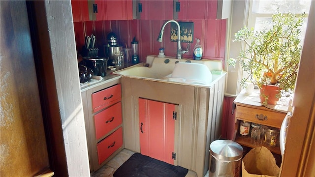 bathroom with sink and tile patterned floors