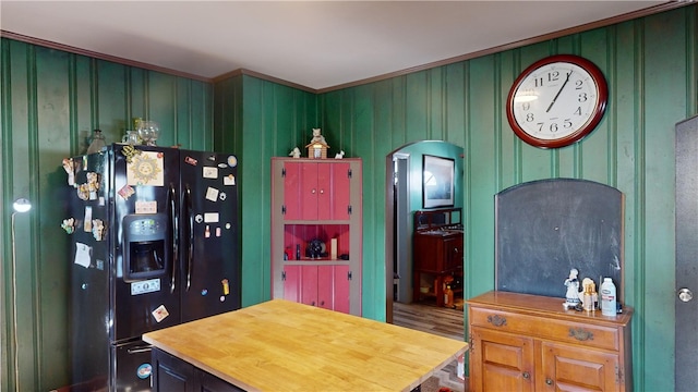 interior space with black fridge