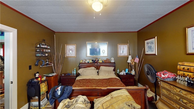 bedroom featuring crown molding