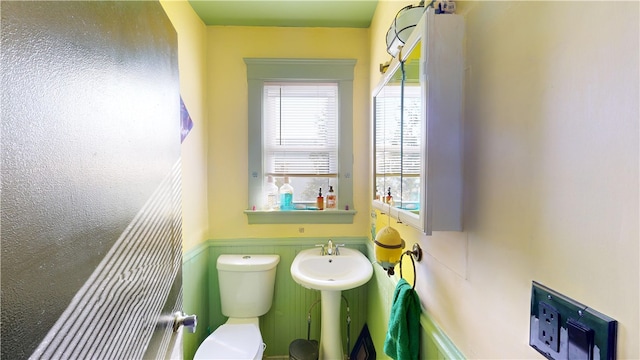 bathroom with sink and toilet