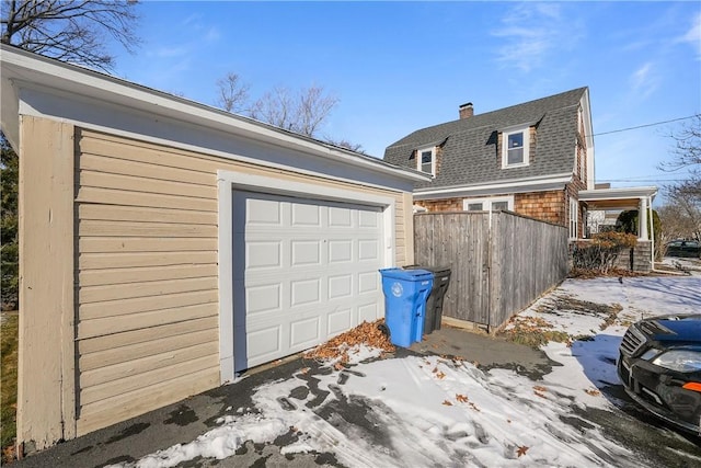 view of snow covered garage