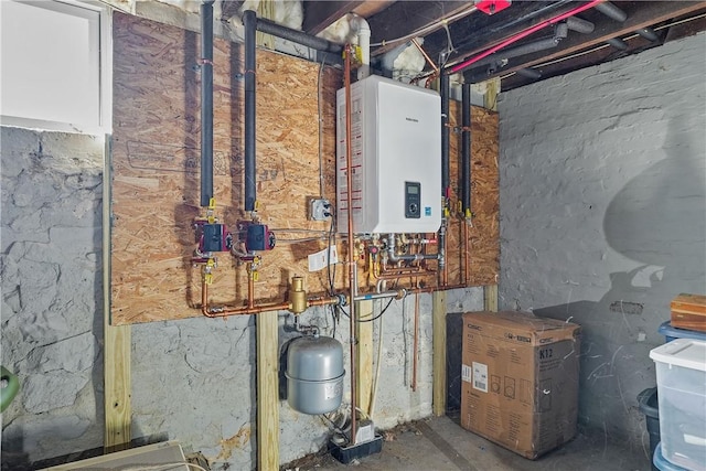 utility room with tankless water heater