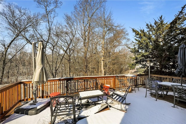 view of snow covered deck