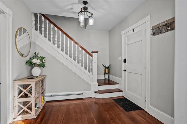 entryway featuring a baseboard radiator and dark hardwood / wood-style flooring