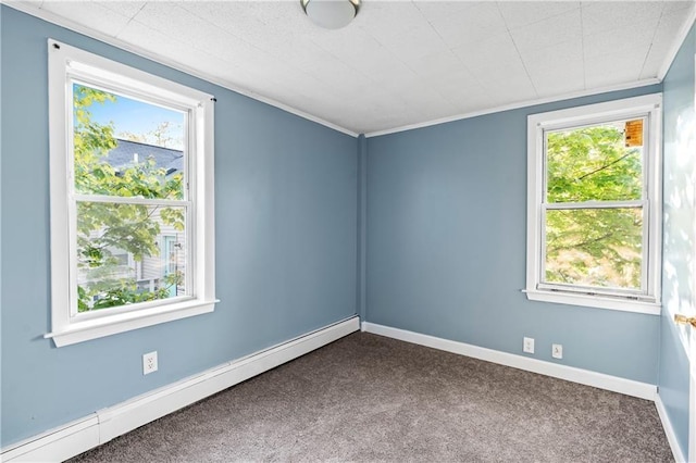 unfurnished room featuring a baseboard heating unit, carpet floors, and ornamental molding