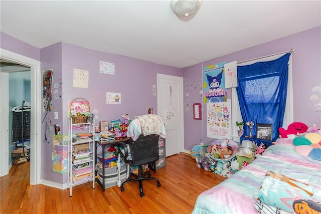 bedroom featuring hardwood / wood-style flooring