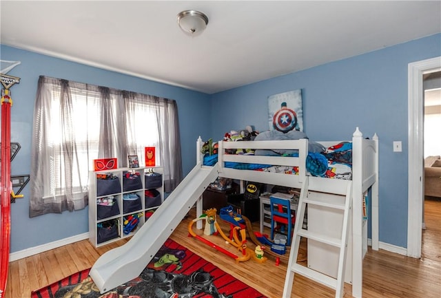 bedroom featuring hardwood / wood-style floors