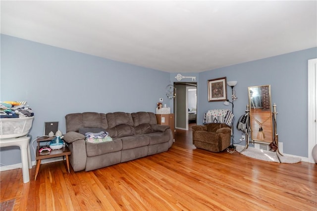 living room with hardwood / wood-style flooring