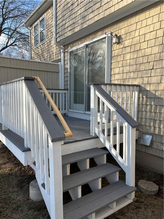 doorway to property with a wooden deck