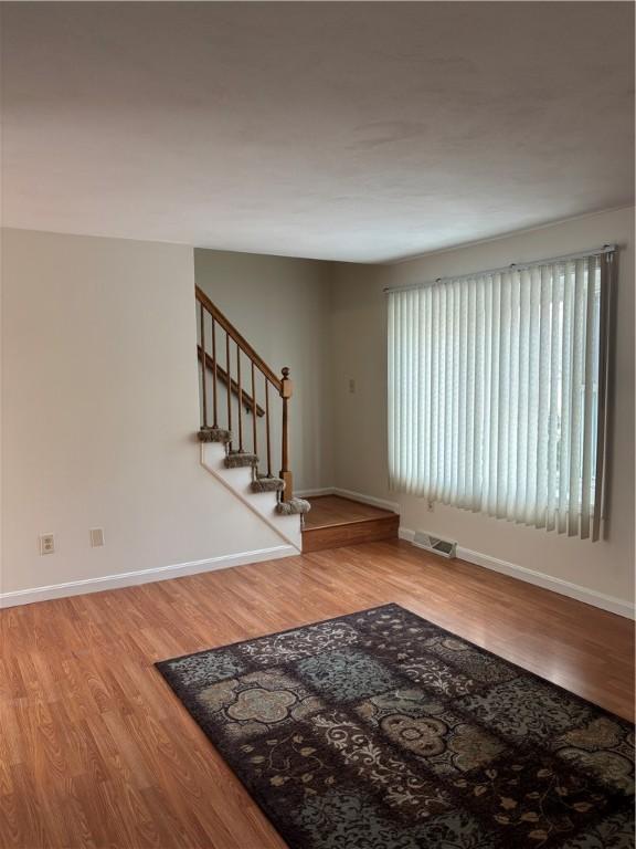 interior space with hardwood / wood-style floors