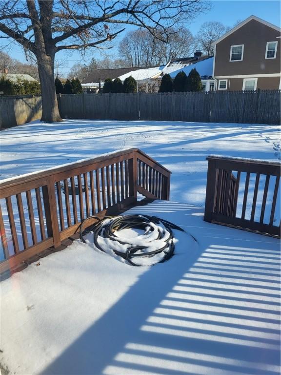 view of snow covered deck