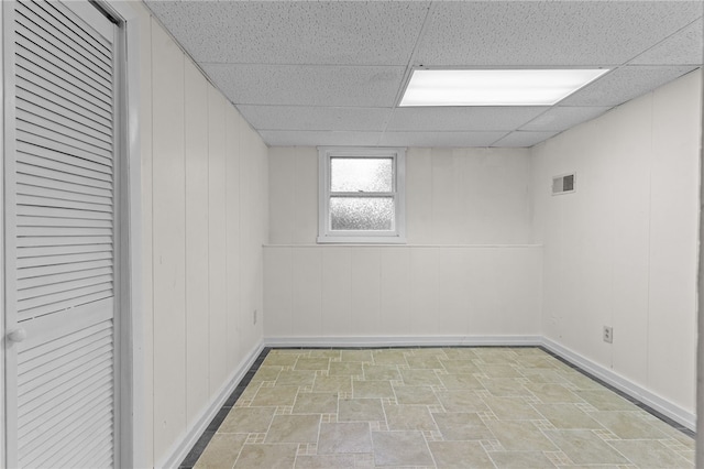 empty room with a drop ceiling