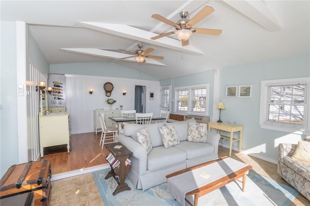 living room with lofted ceiling with beams