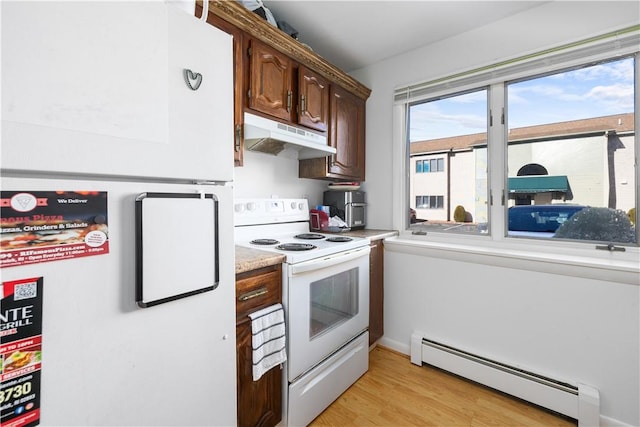 kitchen featuring light hardwood / wood-style flooring, baseboard heating, fridge, dark brown cabinetry, and white electric stove