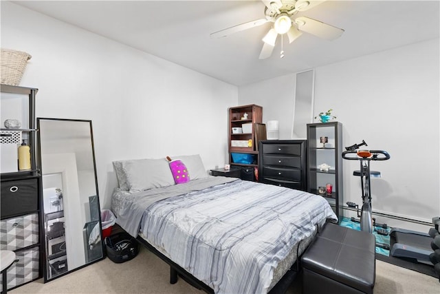 bedroom with light colored carpet, ceiling fan, and baseboard heating